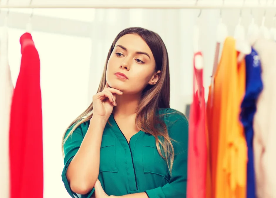 A woman deciding what to wear to an escape room