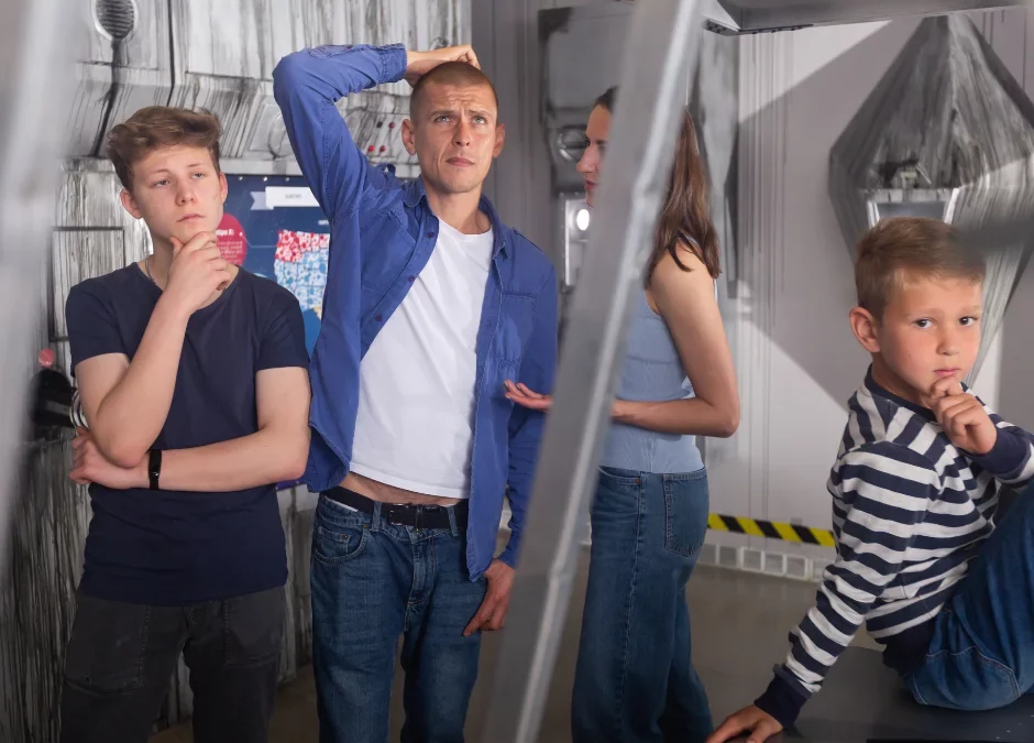 Kids trying to solve escape room riddles in n escape room