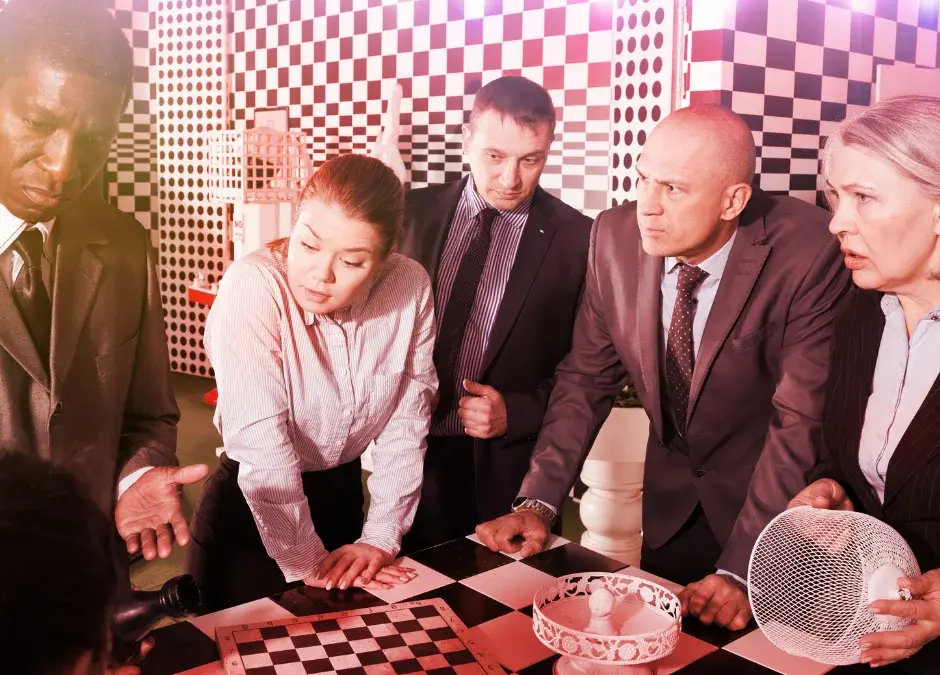 Group of friends trying to figure out escape room plots